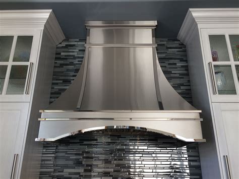 white stainless steel range hood